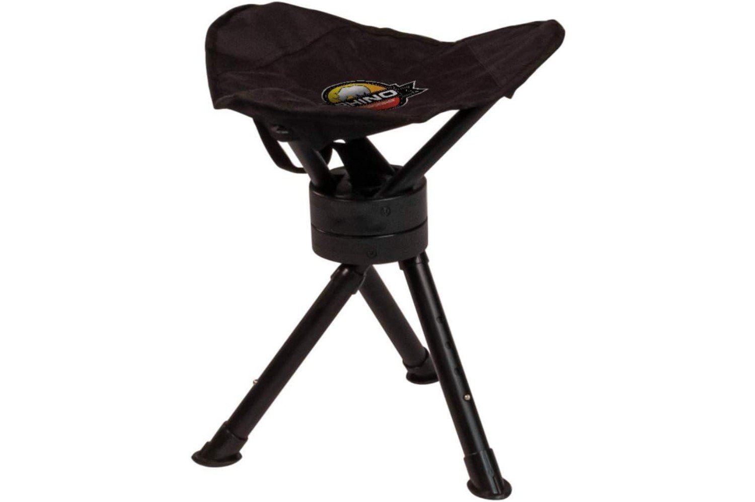 A hunting ground blind set up in a natural outdoor setting, camouflaged among trees and foliage. The blind is designed to blend in with the surroundings, providing a concealed area for hunters.