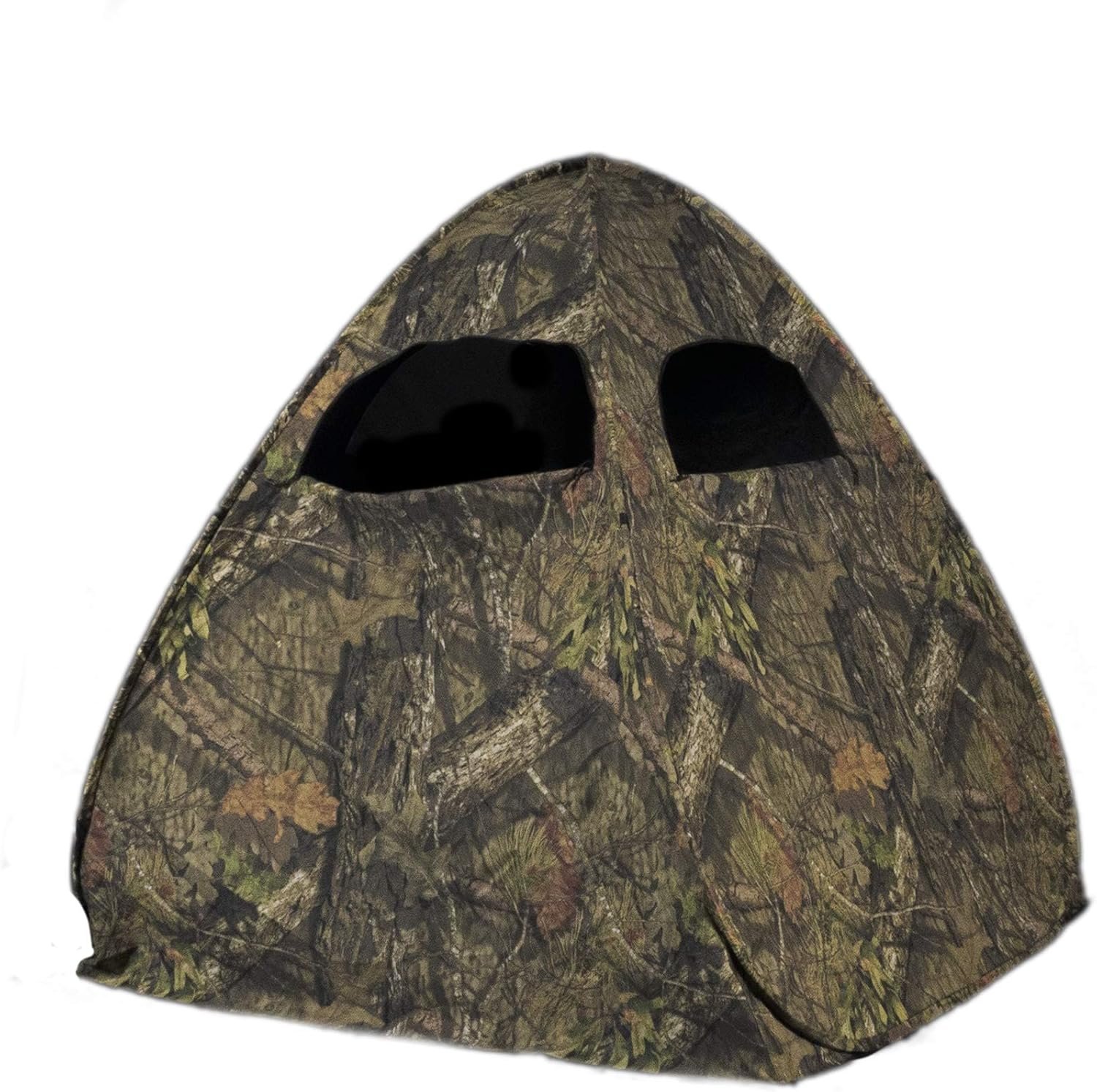 An outdoor hunting game feeder set up in a wooded area. The feeder features a sturdy design with a large barrel and is equipped with a solar panel and timer for automated food dispensing